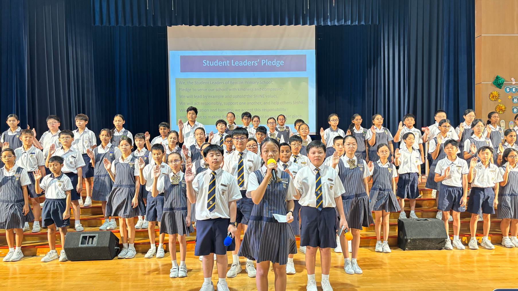 Our student leaders united at centre stage, embodying commitment and responsibility.